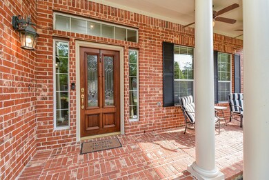 Relax on the front porch with lighting and ceiling fans.