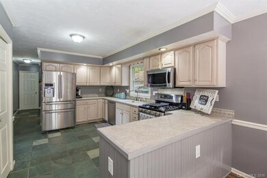 Bright and Spacious Kitchen with Stainless Steel A