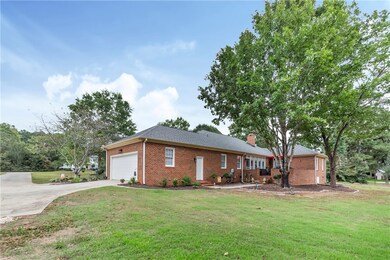 Large driveway and 2 car garage