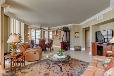 Living room with baseboards, ornamental molding, l