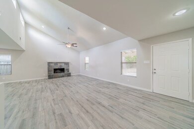 High ceilings and wood burning fireplace