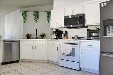 Kitchen featuring a toaster, light tile patterned