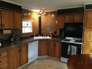 Updated kitchen with tile backsplash
