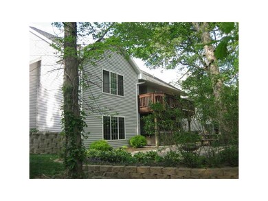 Exterior Back. Private deck with no steps for extr