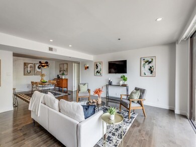 Living area featuring wood finished floors and re