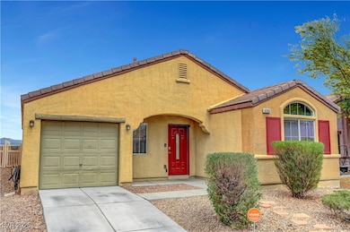 Single story home featuring an attached garage, a