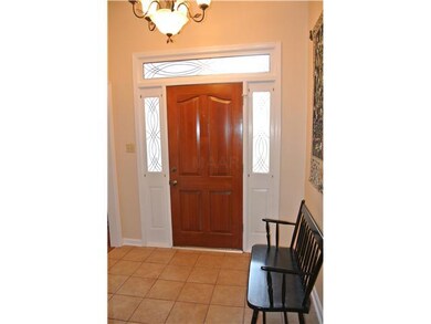 Entry with tile floors.