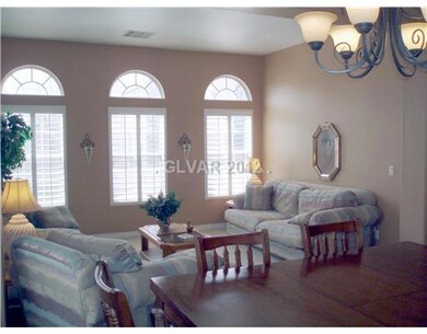 Living Room. NEUTRAL TILE & CARPET THROUGHOUT!