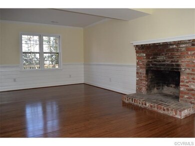Living Room with wood burning fireplace