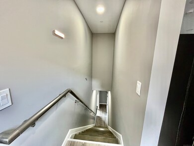 Upstairs to second living room, second kitchen and second bathroom.