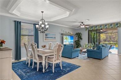 Dining room featuring crown molding and shiplap tr