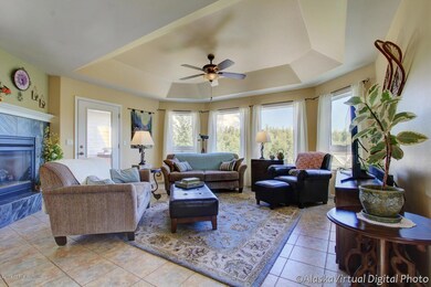 Living Room With Gas FP & Deck Access