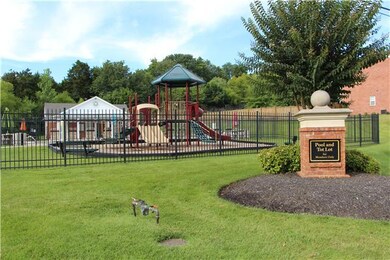 Neighborhood pool and playground area.