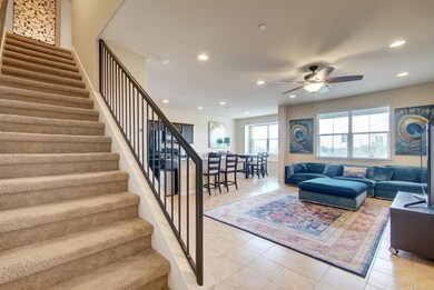 Living room featuring recessed lighting, light ti