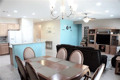 DINING AREA WITH UPGRADED LIGHT FIXTURE!