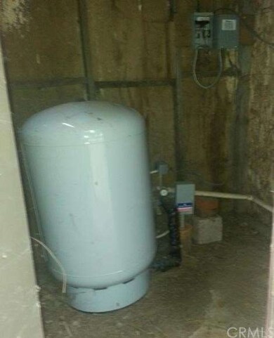 Active well on property. Photo of pump in pump hou