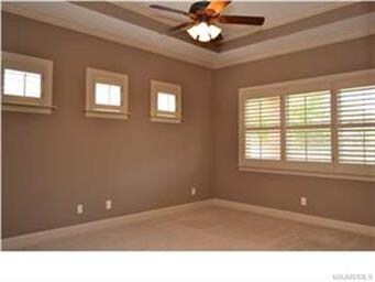 Architectural details continue in the master with 