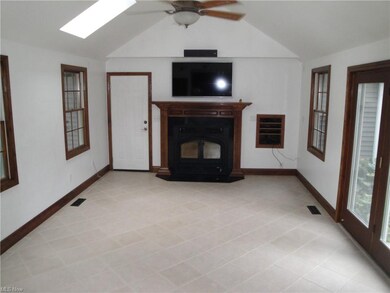 Family room with vaulted ceiling and Vermont Casti