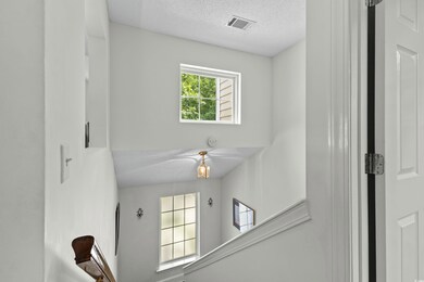 Step with landing and window.