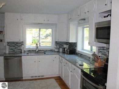 304 Pine St, Elk Rapids, MI 49629 - photo 6