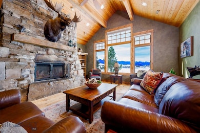 Open concept great room w/ vaulted ceiling, wood b