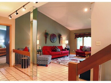 Two story foyer opens to the formal living room