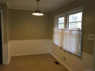 Cute breakfast area is perfect for a round table!