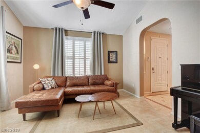 Living room with vaulted ceilings