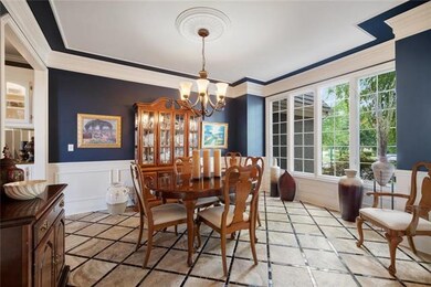 Formal dining room can entertain a large group.