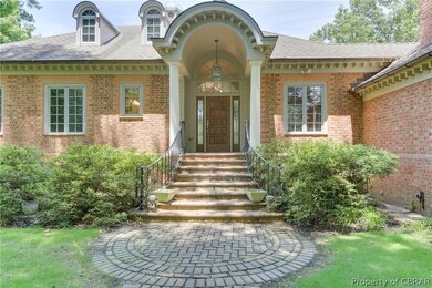 Stately entrance - architectural shingles with cop