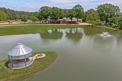 Water view with an outdoor fire pit