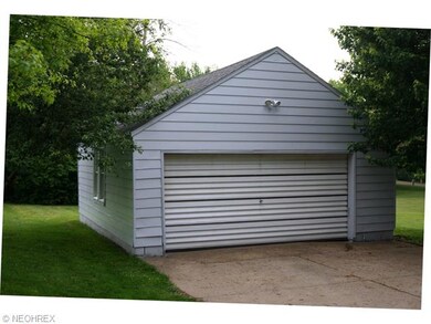 2 CAR DETACHED GARAGE WITH EXTRA WORK SPACE!