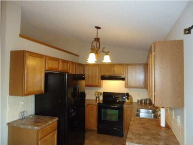 Kitchen with all the updates in neutral colors.