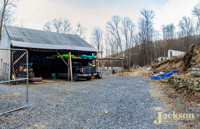 Carport and fenced in area