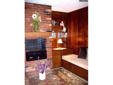 Built-In Grill and seating with tons of storage.