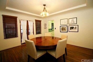 Formal dining room with original hardwood floors, 