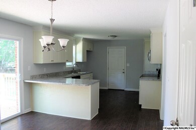 Open breakfast and kitchen area.