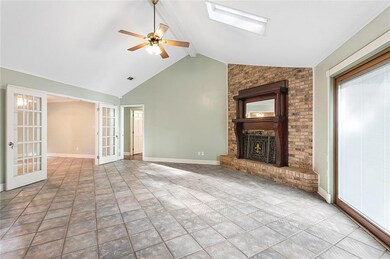 Den has corner fireplace (Gas Logs). New Door to p