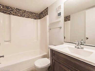 Full bathroom with bathtub / shower combination, v