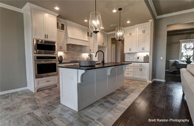 Photos are pictures of a previous home built, home
