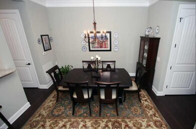 The dining room opens off of the living room and can handle a nice size table for entertaining.