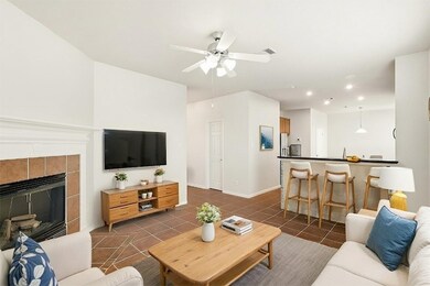 Open-concept living area connecting seamlessly to the kitchen and breakfast room. **Virtually Staged**