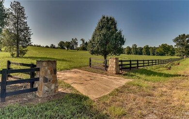 Stone columns in to one of the 4 homesites.