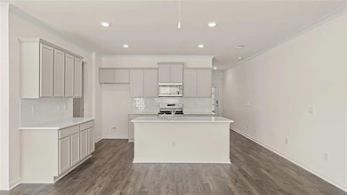 Kitchen featuring stainless steel appliances, deco