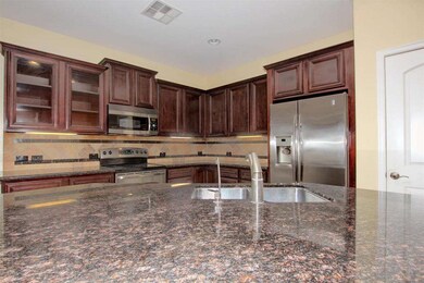 Upgraded Cabinets and Tiled Backsplash!