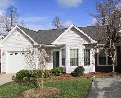 Exterior Front View With Private Driveway & Visitor Parking