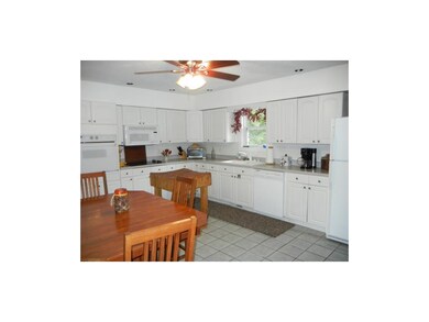 Wow! What a great kitchen with tons of cabinets!!