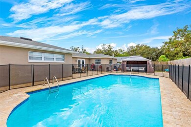 Large inviting pool with large deck/paver area for sunbathing, grilling, and dining. 
