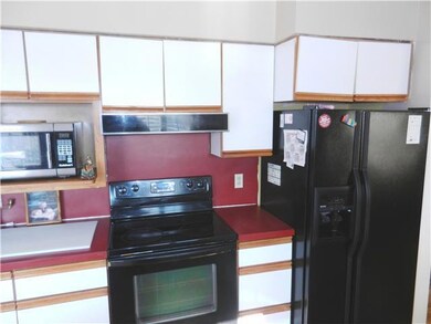 Kitchen with black appliances
