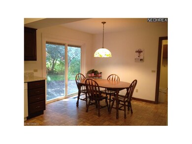 Remodeled kitchen eating area: new flooring, paint